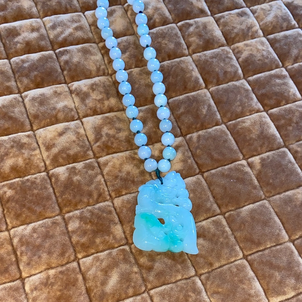 Elegant Blue Beaded Necklace with Jade Pendant